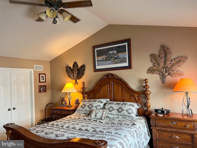 bedroom with lofted ceiling, ceiling fan, and visible vents