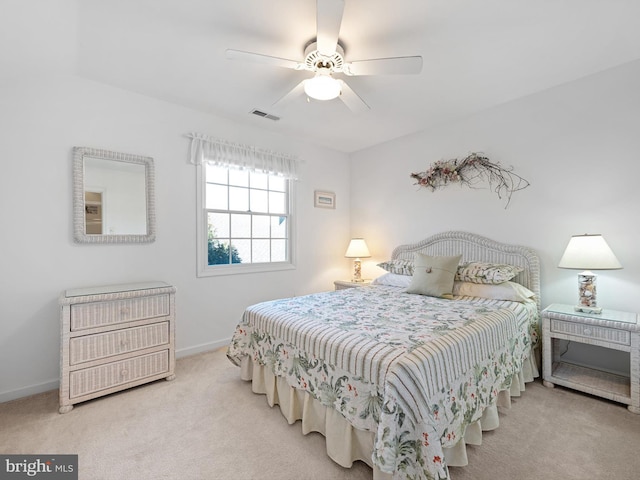 bedroom featuring ceiling fan and carpet floors