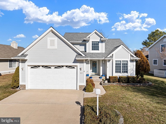 front of property featuring a garage and a front lawn