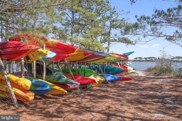 view of play area with a water view