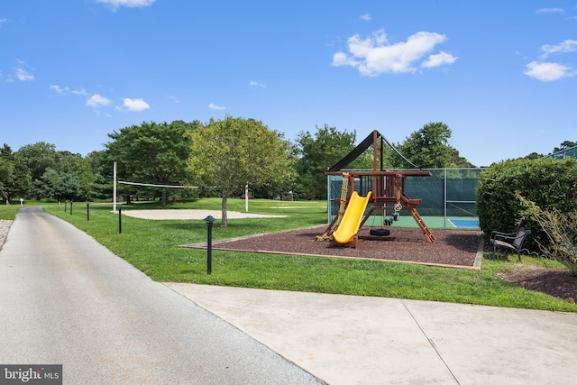 view of play area featuring a yard and volleyball court