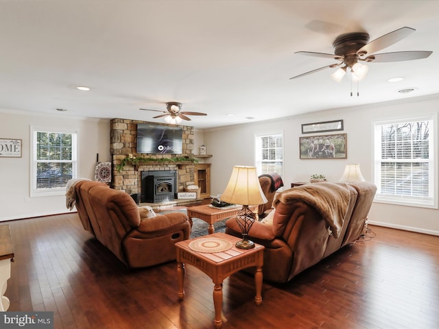 living room featuring crown molding and dark hardwood / wood-style floors