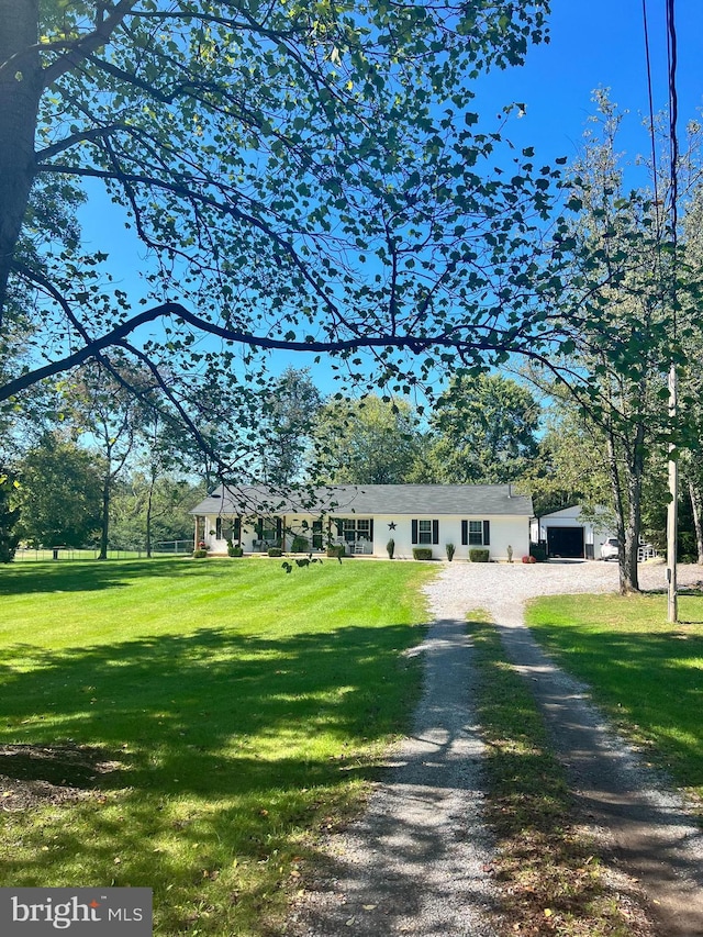 view of front of property with a front lawn