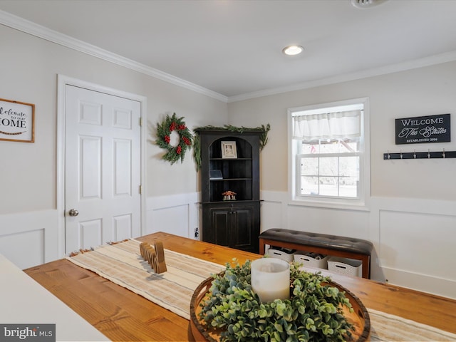 interior space with crown molding