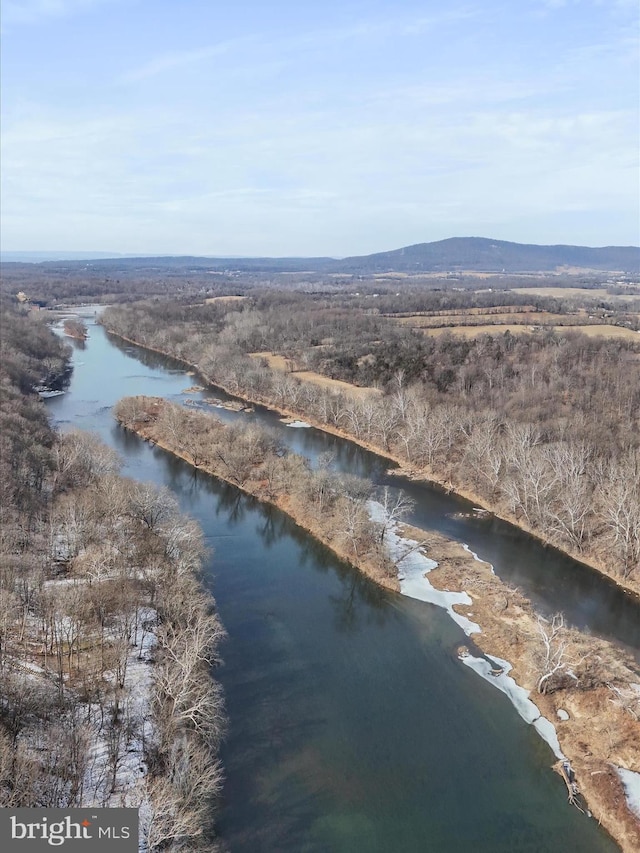 bird's eye view featuring a water and mountain view