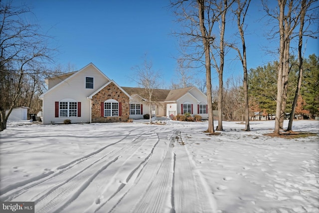 view of front of home with stone siding