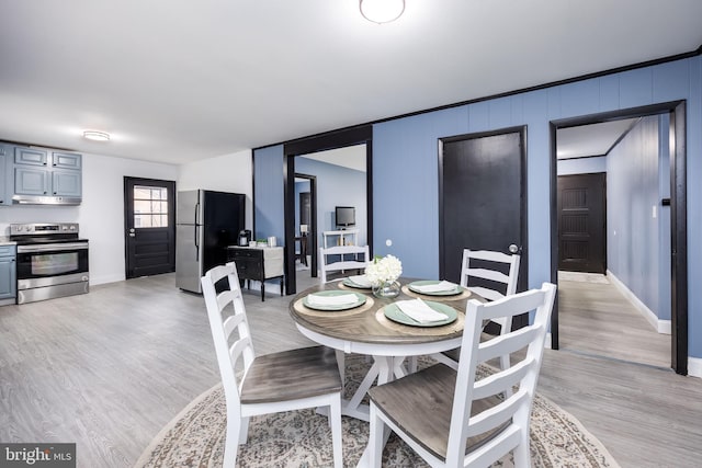 dining room featuring light wood-type flooring