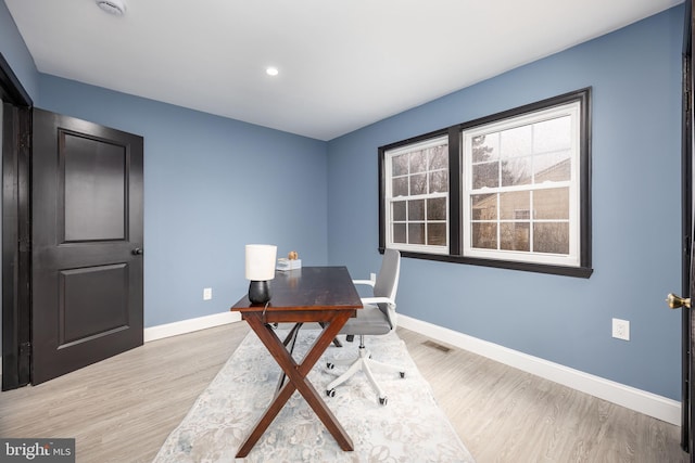 office space featuring light hardwood / wood-style flooring