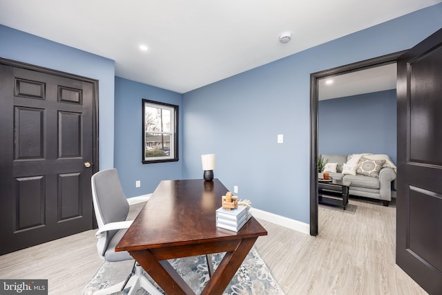 office space featuring light hardwood / wood-style flooring