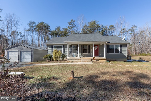 single story home with a garage, an outdoor structure, a front yard, and a porch