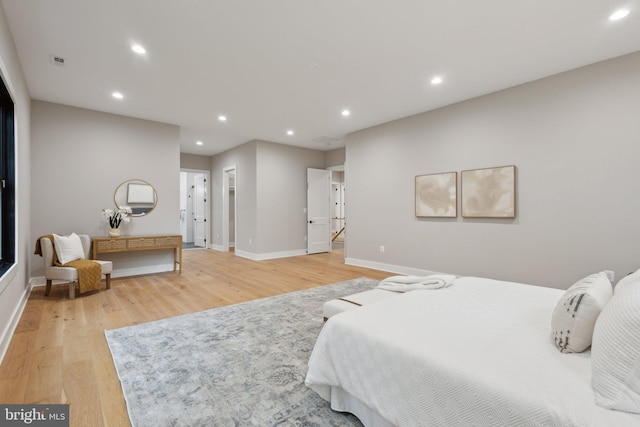 6919 Berkeley St, Falls Church, VA 22043 - bedroom featuring recessed lighting, light wood-style floors, and baseboards