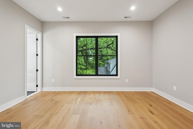 6919 Berkeley St, Falls Church, VA 22043 - empty room featuring light wood-type flooring, baseboards, and recessed lighting