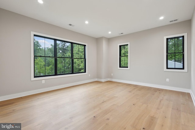 6919 Berkeley St, Falls Church, VA 22043 - empty room with light wood-type flooring, recessed lighting, and baseboards