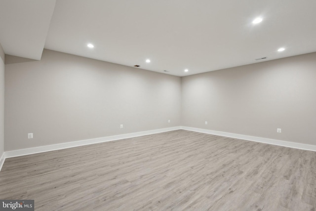 6919 Berkeley St, Falls Church, VA 22043 - below grade area with recessed lighting, light wood-style floors, and baseboards