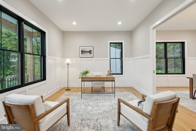 6919 Berkeley St, Falls Church, VA 22043 - sitting room featuring a decorative wall, wood finished floors, wainscoting, a desk, and recessed lighting