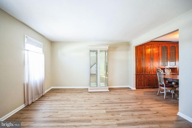 spare room featuring light hardwood / wood-style flooring