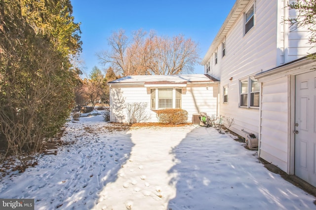 view of snow covered property