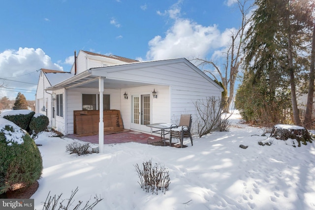 view of snow covered property