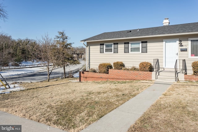 exterior space featuring a front yard