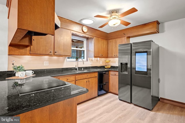 kitchen with ceiling fan, sink, light wood-type flooring, and black appliances