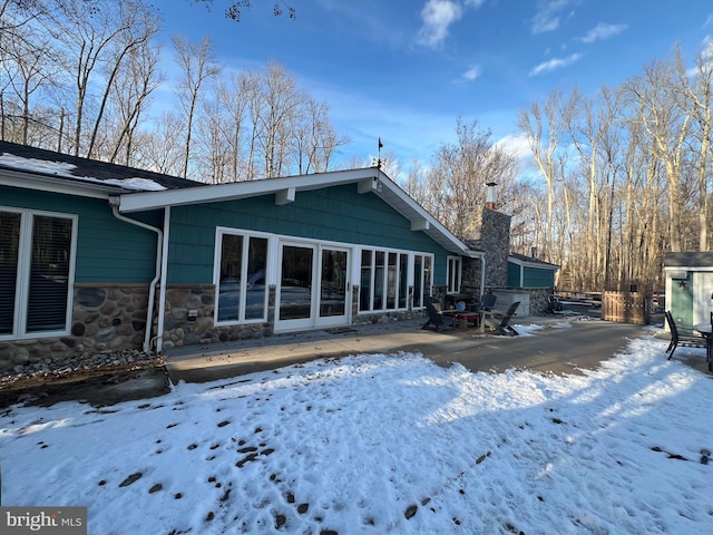 view of snow covered property