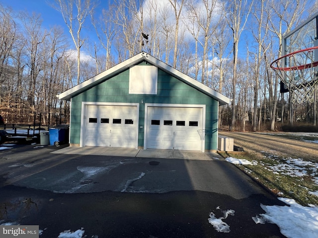 view of snow covered garage