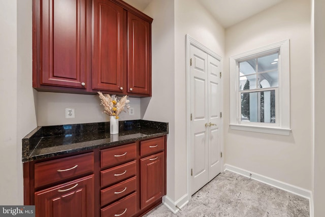 kitchen with dark stone counters