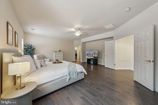 bedroom featuring ceiling fan and dark hardwood / wood-style flooring