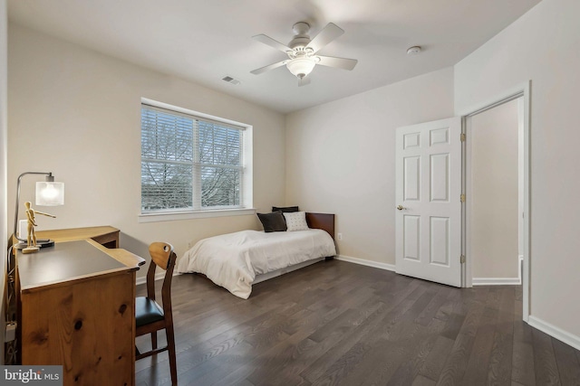 bedroom featuring dark wood-type flooring and ceiling fan