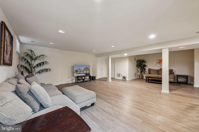 living room featuring light wood-type flooring