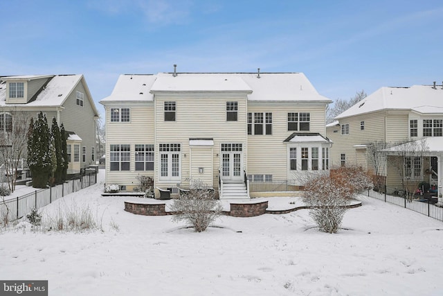 view of snow covered property