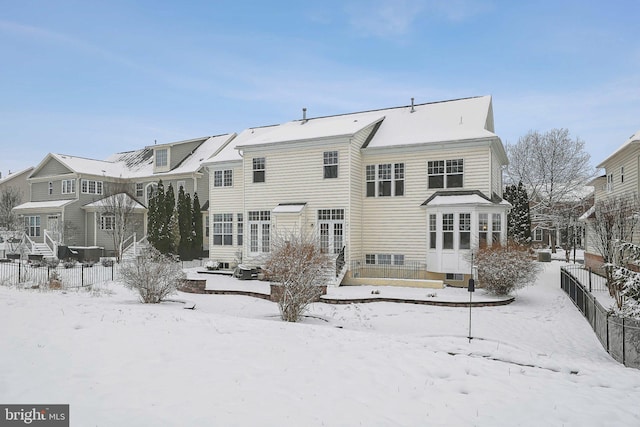 view of snow covered property