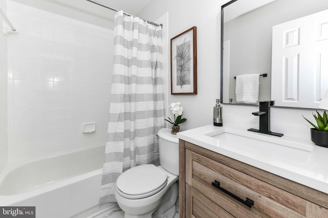 full bathroom with vanity, shower / bath combination with curtain, and toilet