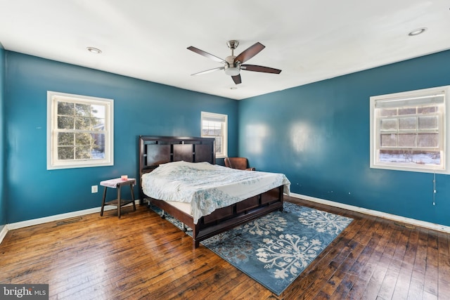 bedroom featuring dark wood-type flooring and ceiling fan