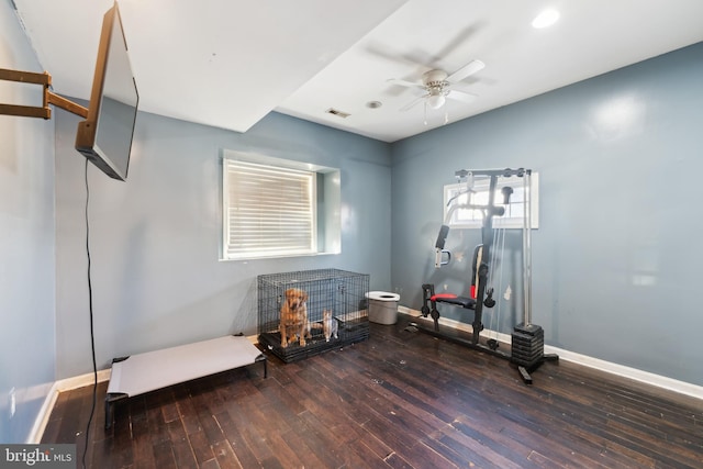 sitting room with hardwood / wood-style flooring and ceiling fan