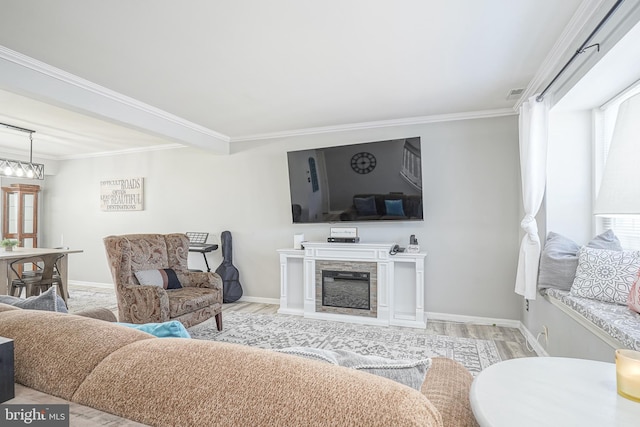 living room with ornamental molding and light wood-type flooring