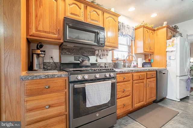 kitchen featuring sink and appliances with stainless steel finishes