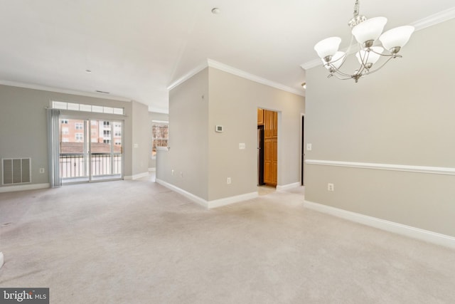 empty room with light carpet, a notable chandelier, and ornamental molding