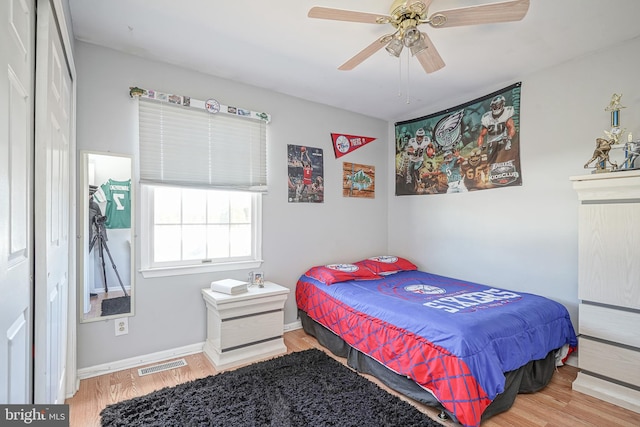 bedroom featuring ceiling fan and hardwood / wood-style floors