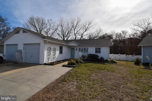 single story home featuring an attached garage, driveway, a front lawn, and fence
