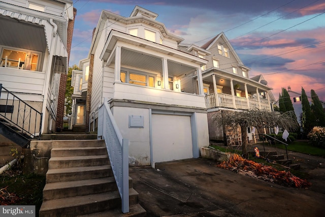 view of front of property with a garage