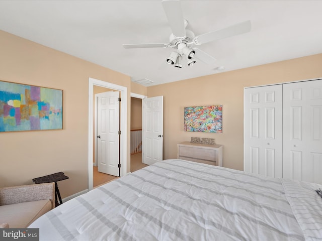 bedroom with a closet and ceiling fan