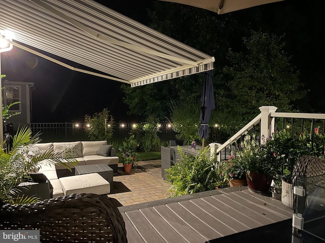 patio at night with outdoor lounge area