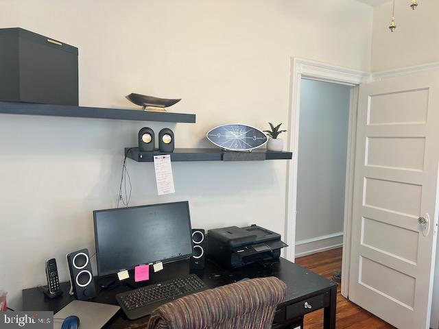 home office featuring dark wood-type flooring