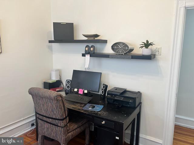 office area with dark hardwood / wood-style floors