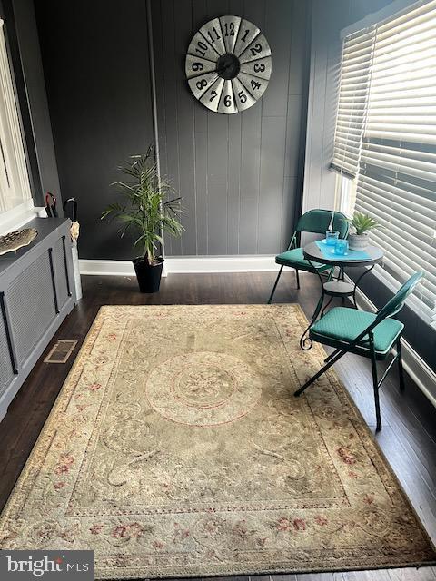 interior space with dark wood-type flooring