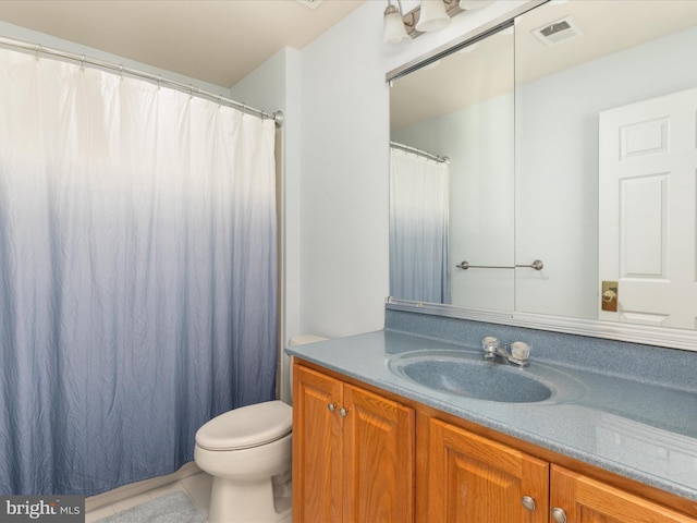 full bathroom featuring tile patterned flooring, visible vents, toilet, and vanity