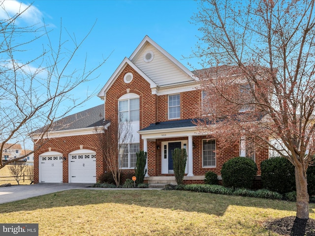 view of front of home featuring driveway, a porch, a front yard, a garage, and brick siding