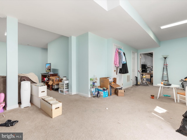 basement with carpet and baseboards