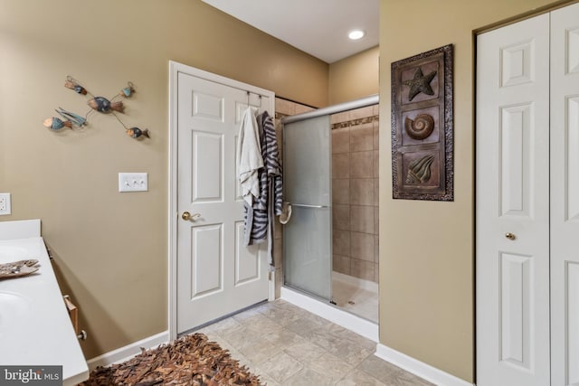 bathroom with vanity and an enclosed shower